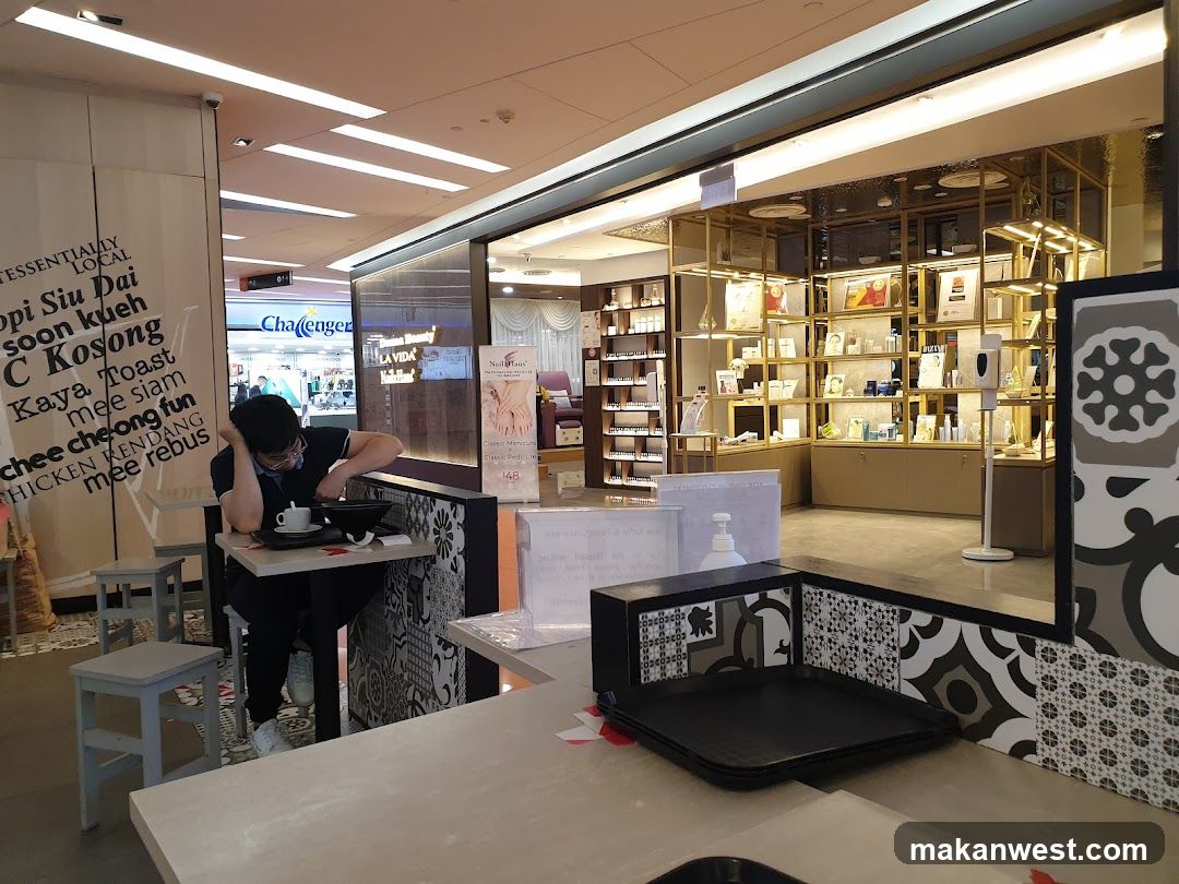 Food stall interior with customer