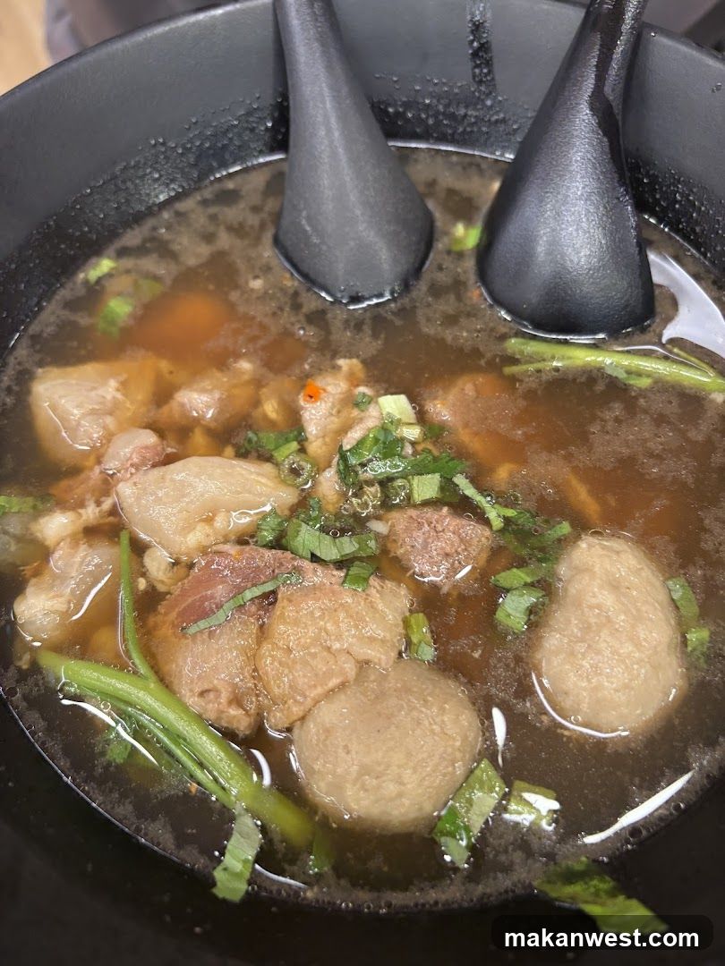 Soup Bowl with Meatballs and Greens