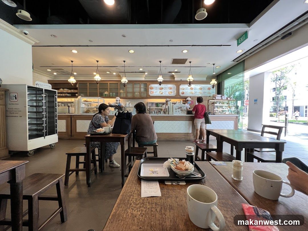 Cafe Interior with Customers and Staff