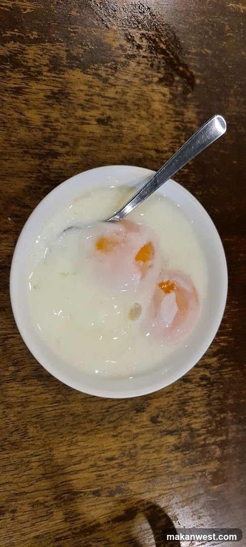 Bowl of Milk with Egg Yolk