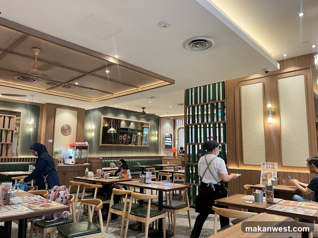 Restaurant Interior with Staff and Customers