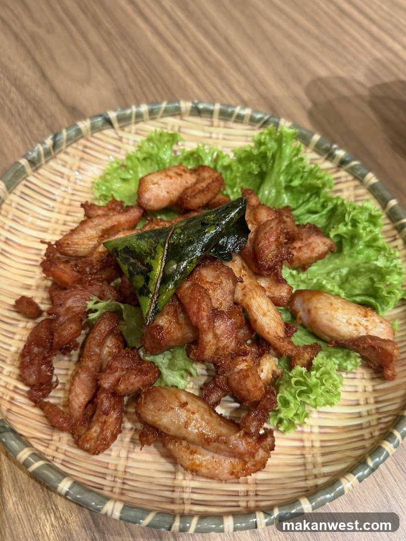 Crispy Pork with Leaf Garnish