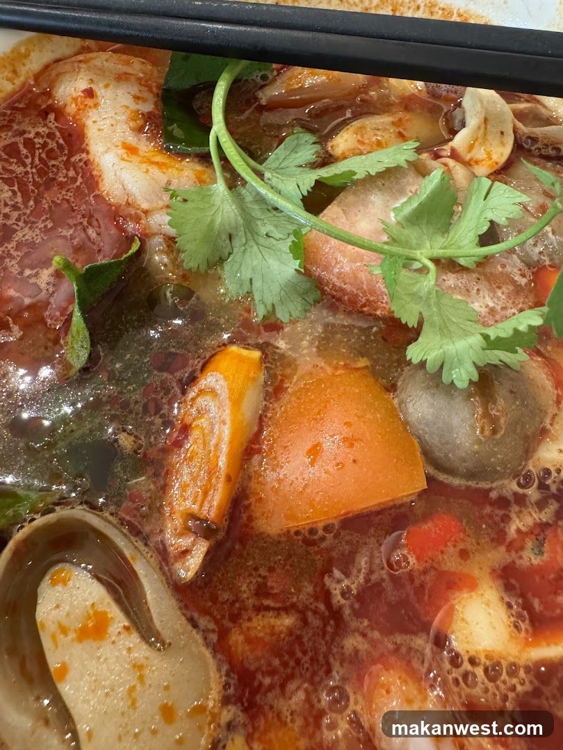 Spicy Hot Pot with Cilantro Garnish