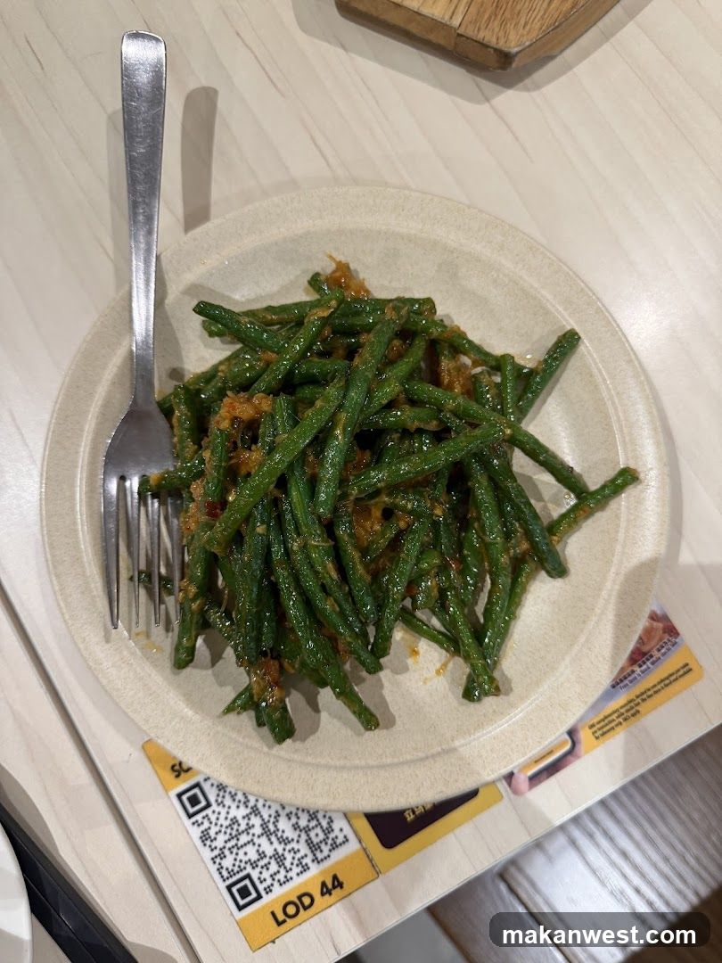 Plate of Green Beans with Sauce