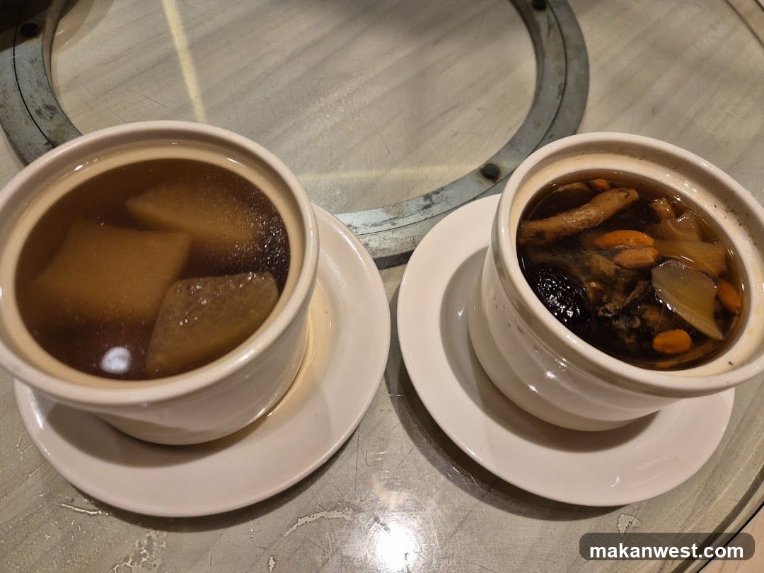 Two bowls of soup on a table
