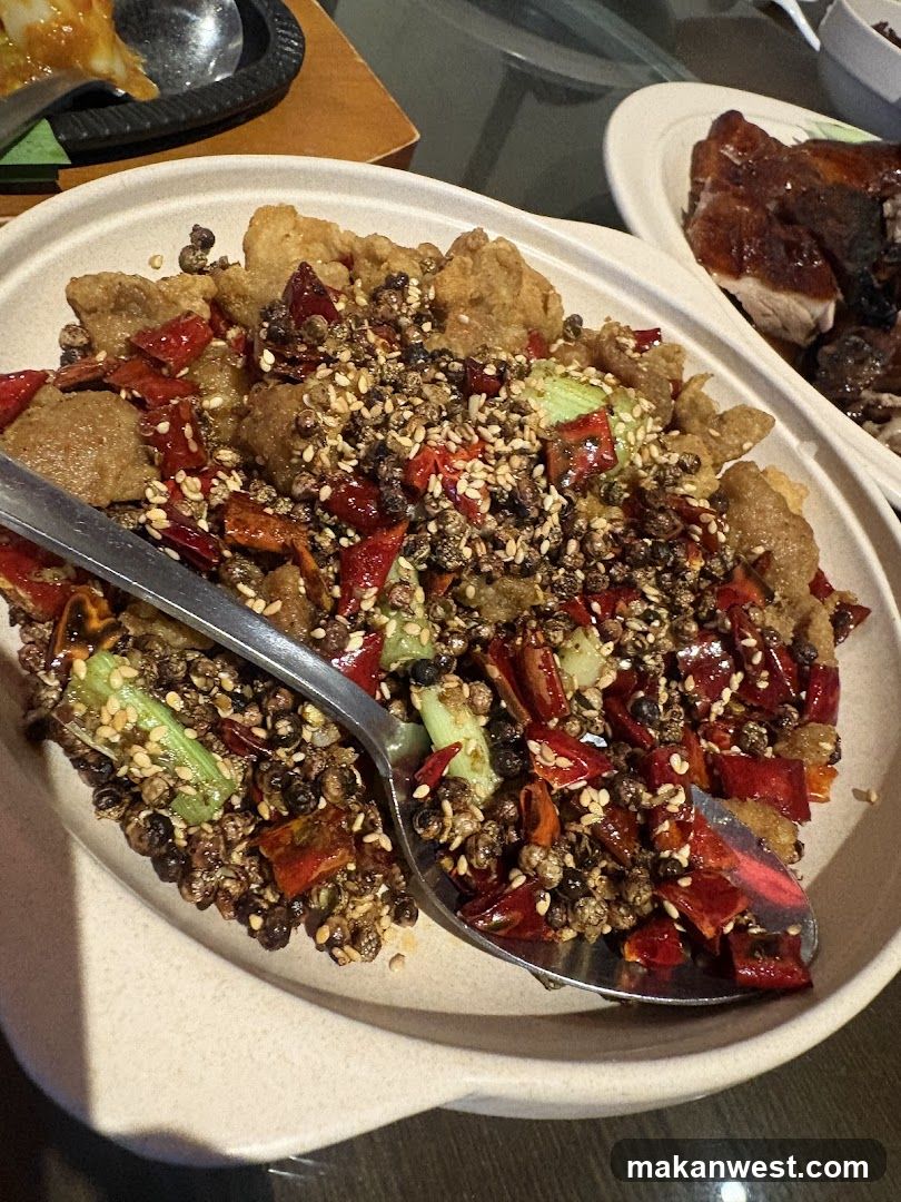 Sichuan-style Spicy Dish with Peppercorns and Sesame Seeds