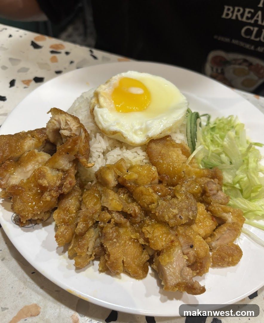 Fried Chicken Rice Bowl with Fried Egg and Lettuce
