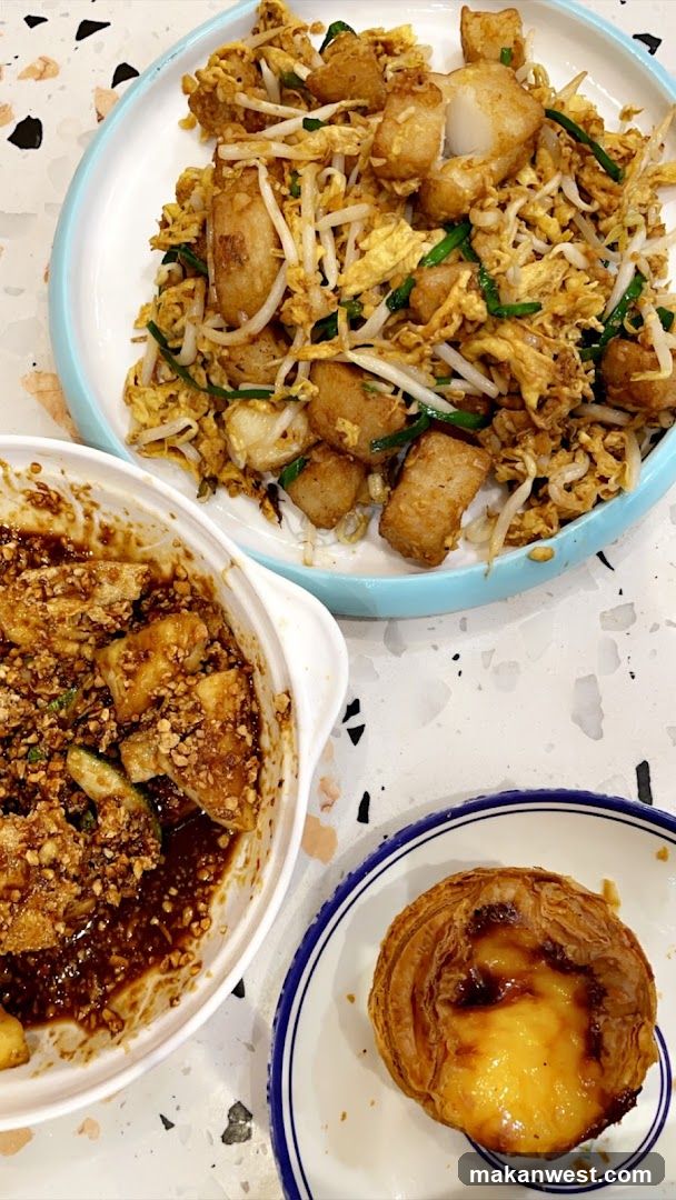 Food Spread with Egg Tarts and Stir-fry