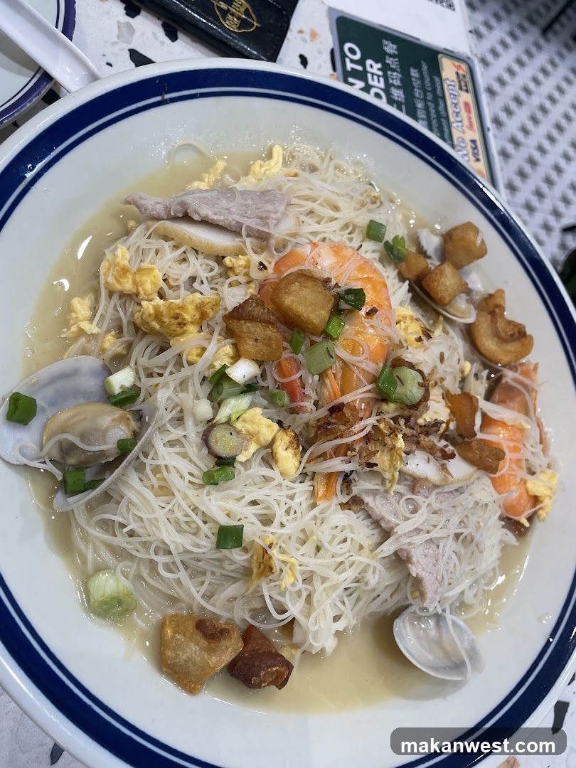 Noodle Dish with Seafood and Toppings