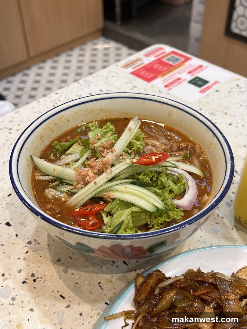 Bowl of Noodle Soup with Vegetables and Fried Rice
