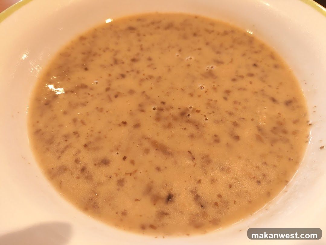Bowl of soup with visible ingredients