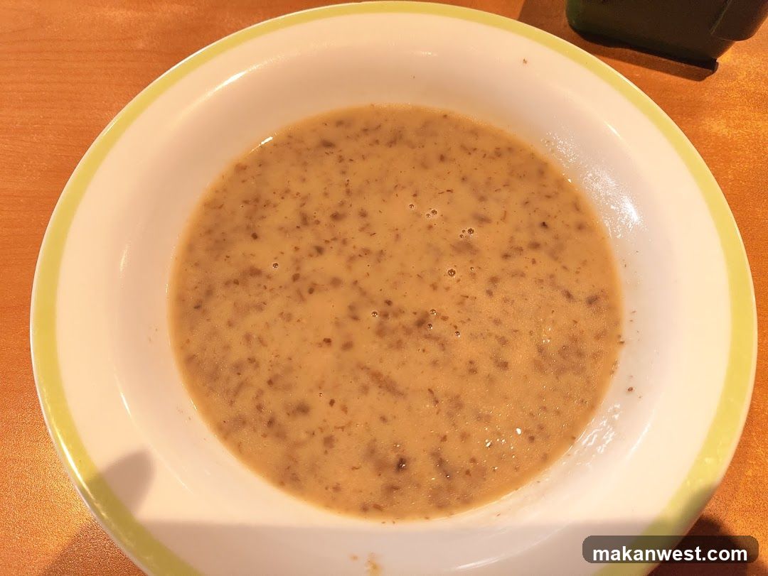 Bowl of soup with visible ingredients