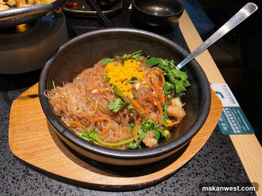 Dish with glass noodles and garnishes