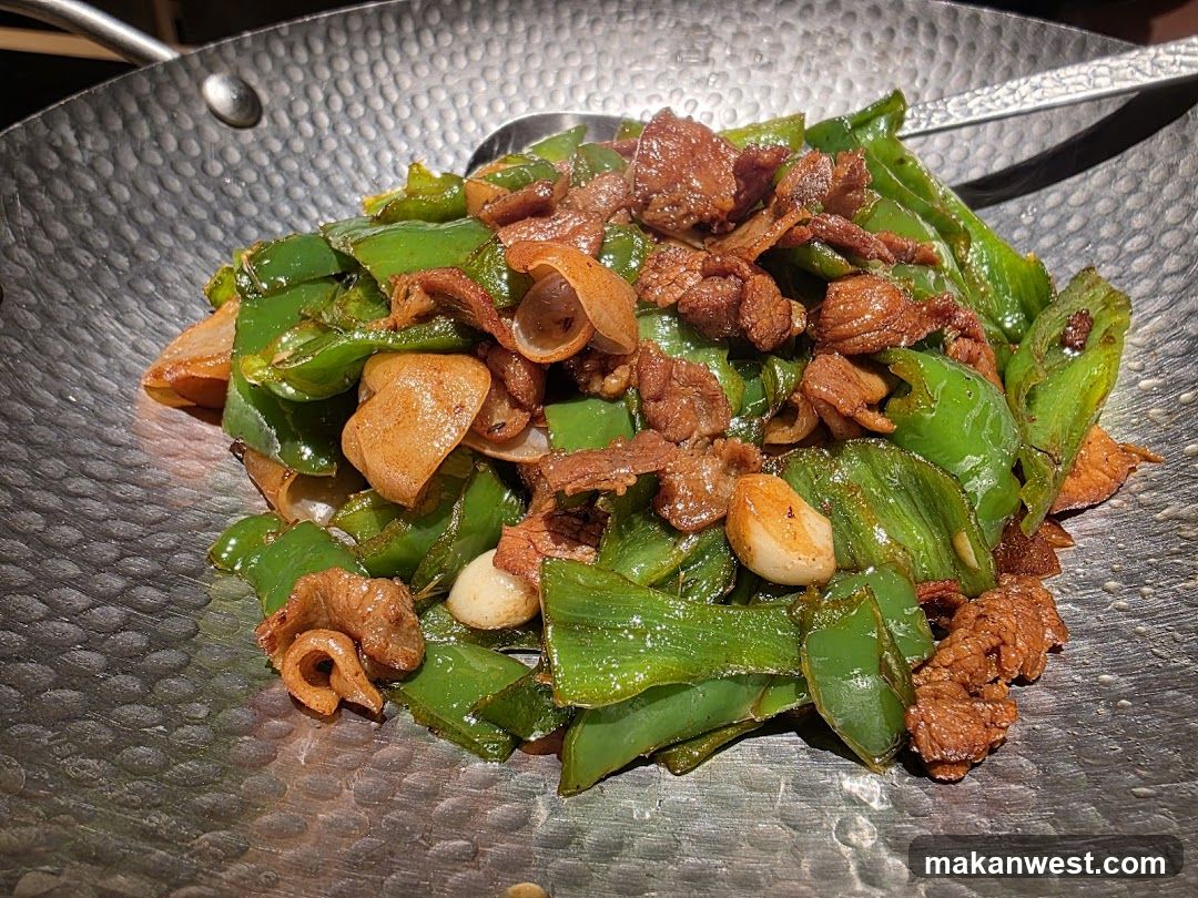 Stir-fried Peppers and Meat in Wok