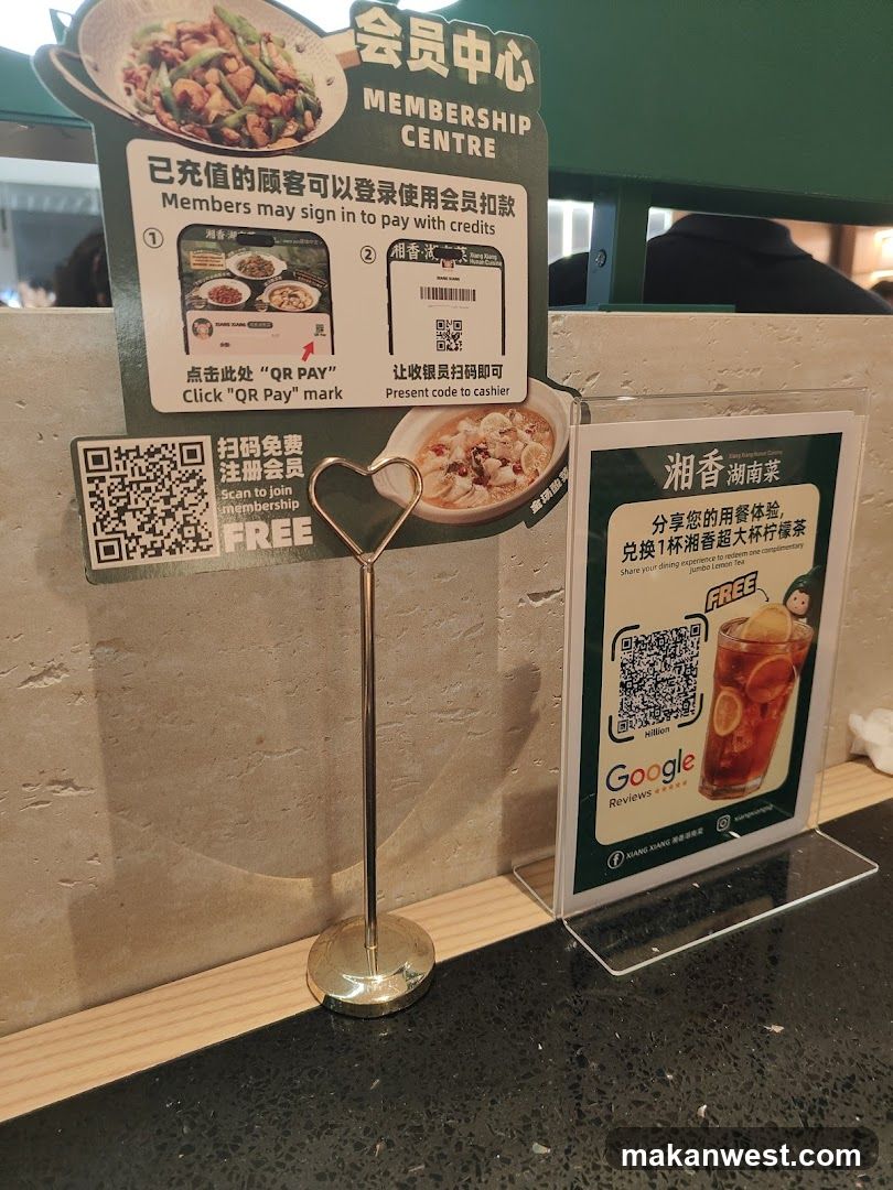 Membership and Promotion Signage at Restaurant Counter
