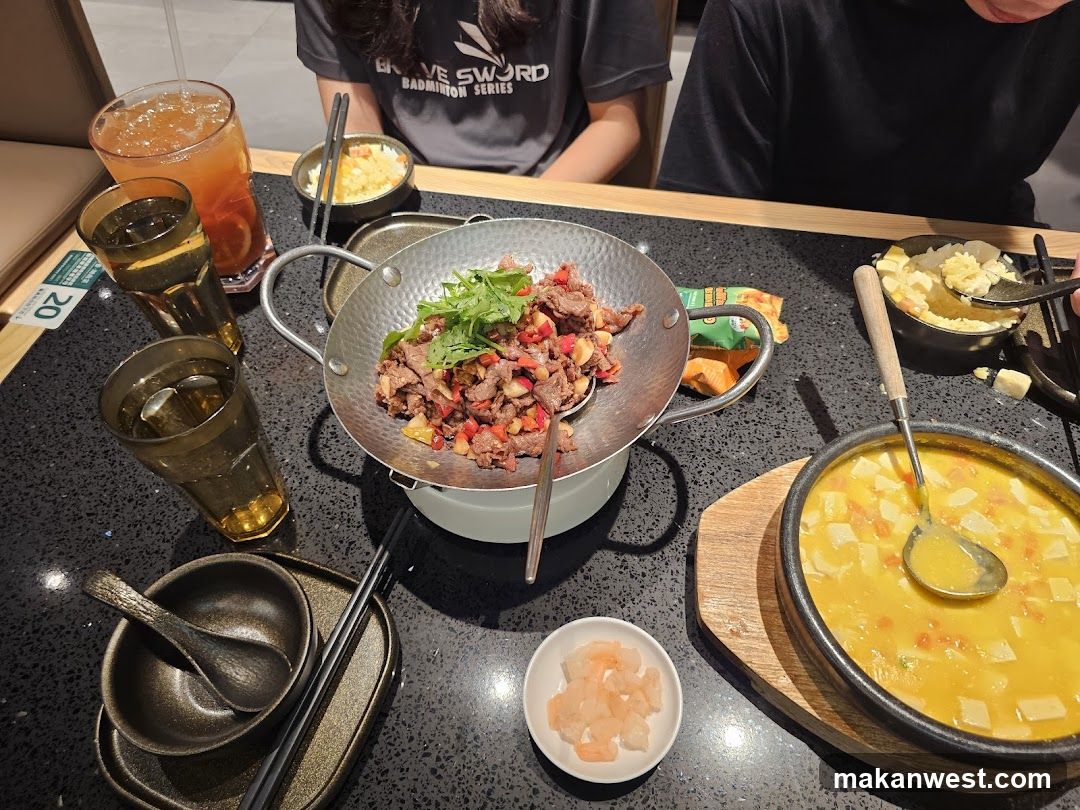 Dining Table with Hot Pot and Side Dishes