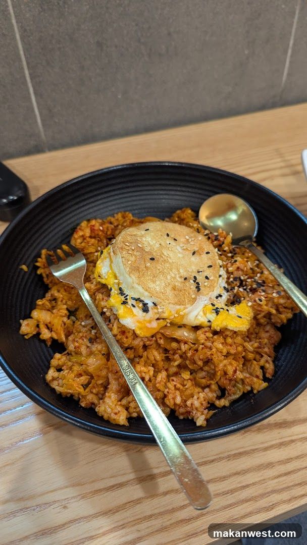 Bowl of Fried Rice with Egg and Bun