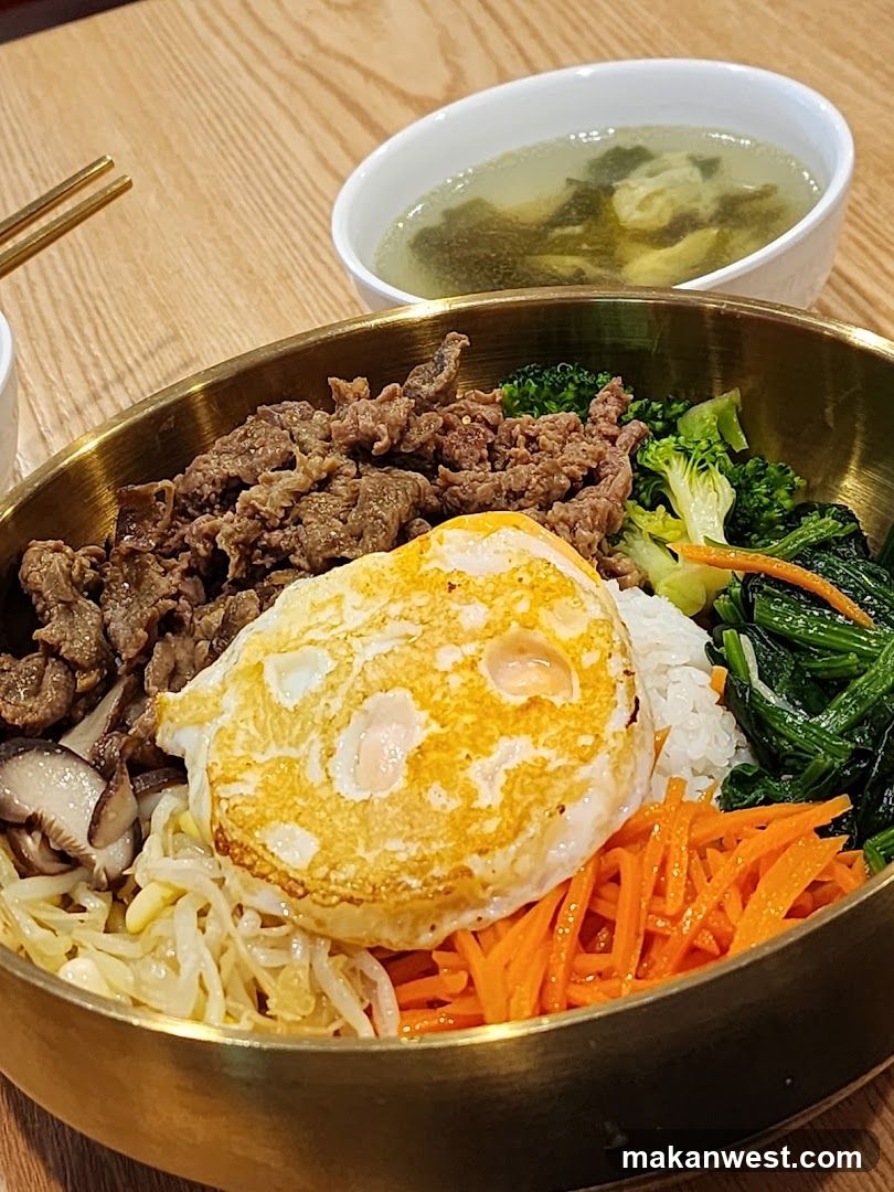 Bowl of Korean-style rice with beef and vegetables