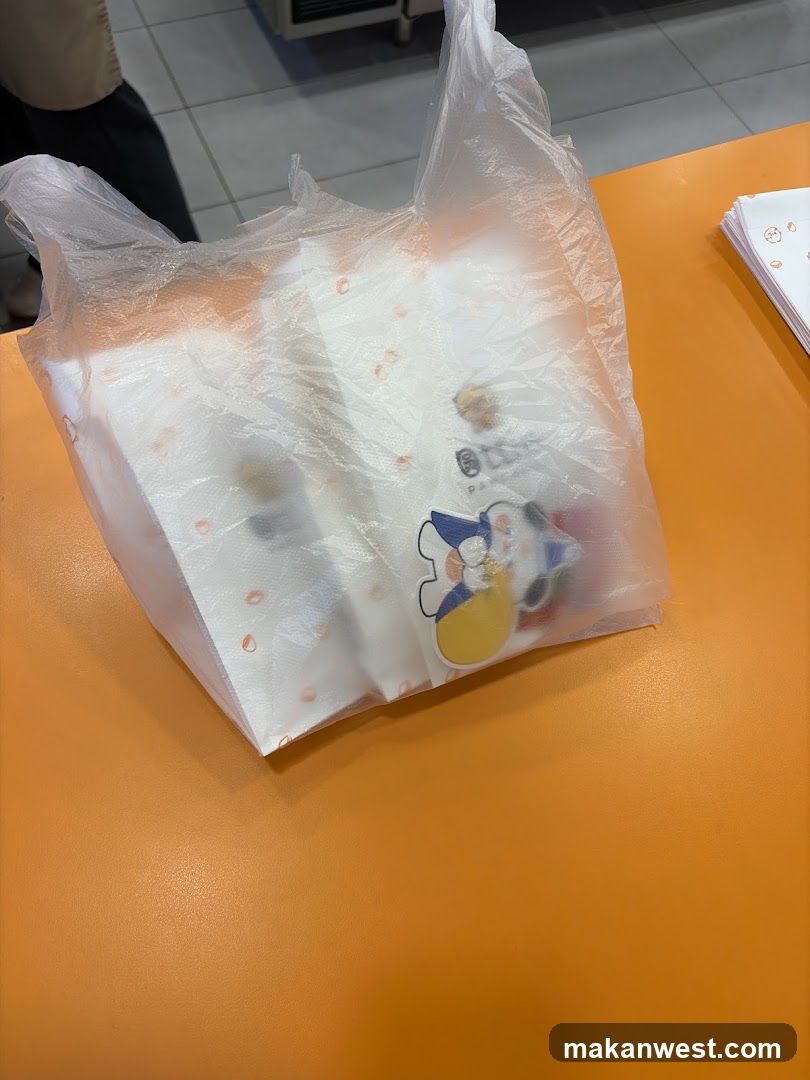 Plastic bag with cartoon design on orange table