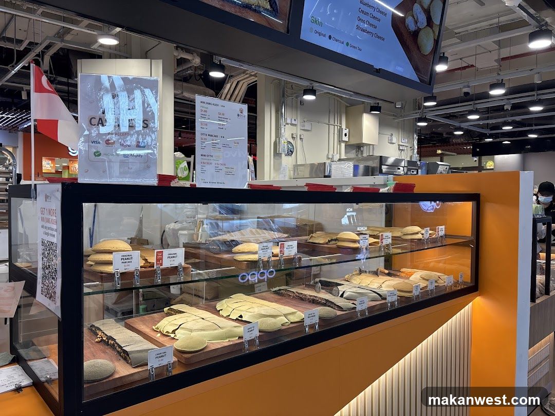Food Display Case with Sandwiches and Pastries