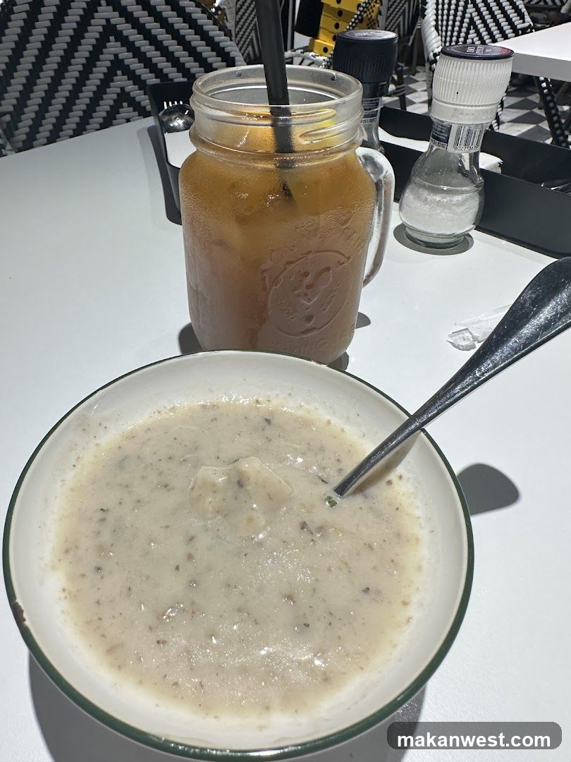 Dining Table with Soup and Iced Drink
