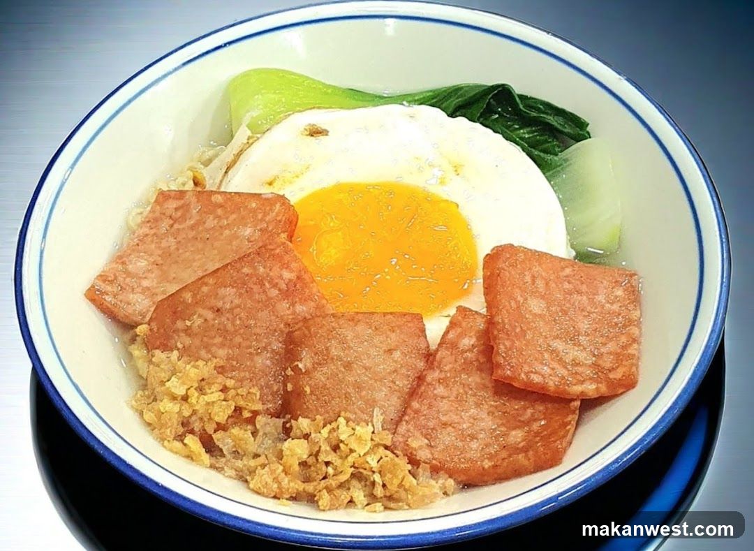 Bowl of Noodles with Egg and Meat Slices