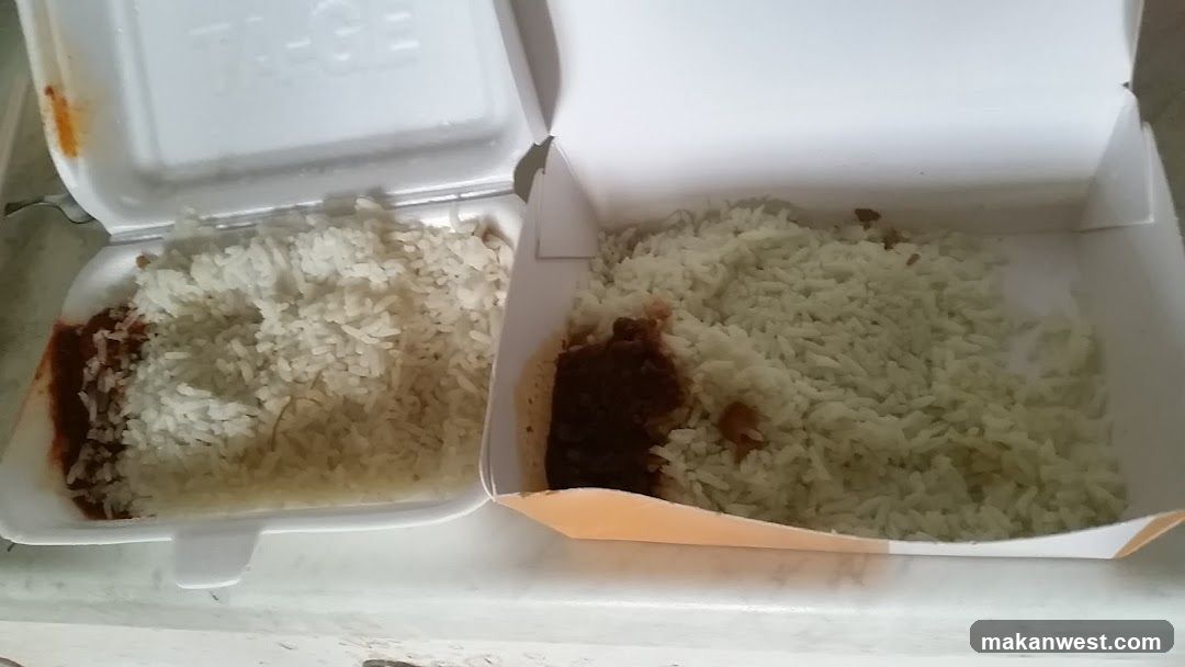 Takeout Food Containers with Rice and Sauce