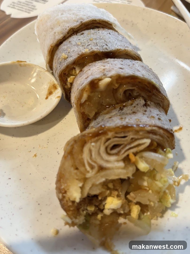 Rolled Food Dish with Sauce