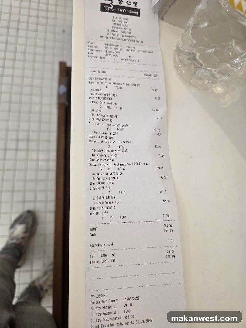 Receipt and Bottle on Table