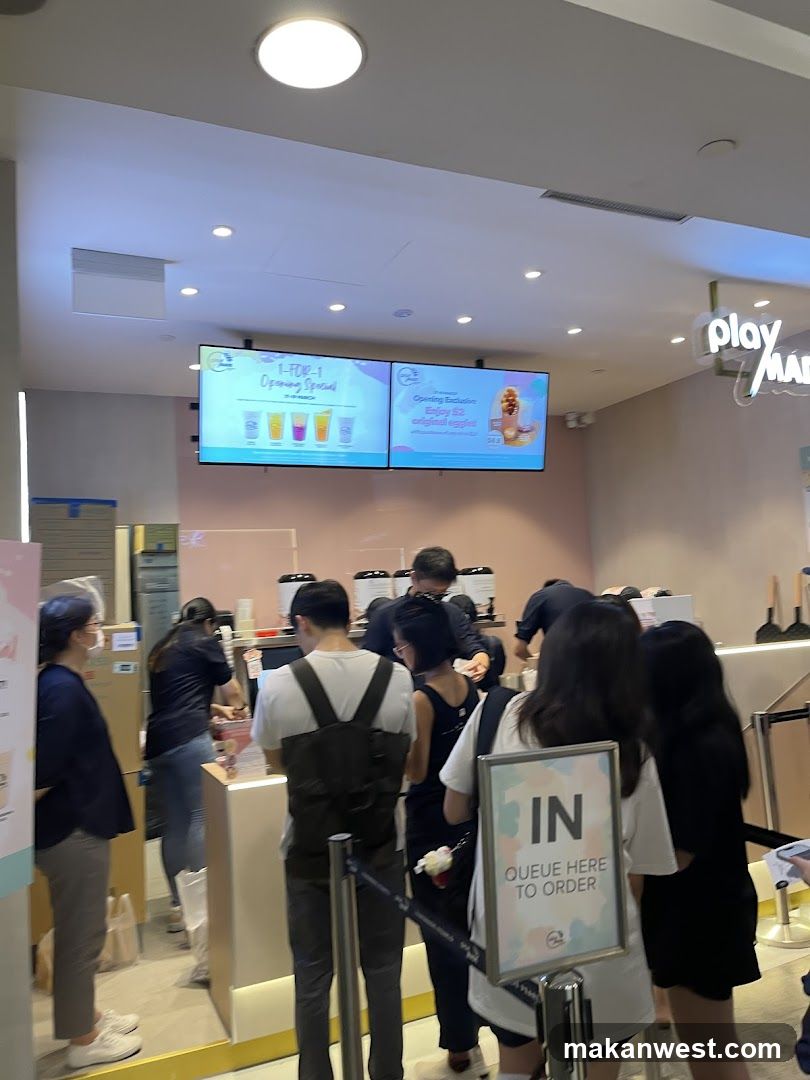 Queue at a beverage shop counter