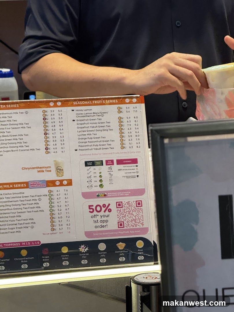 Staff preparing drink at counter