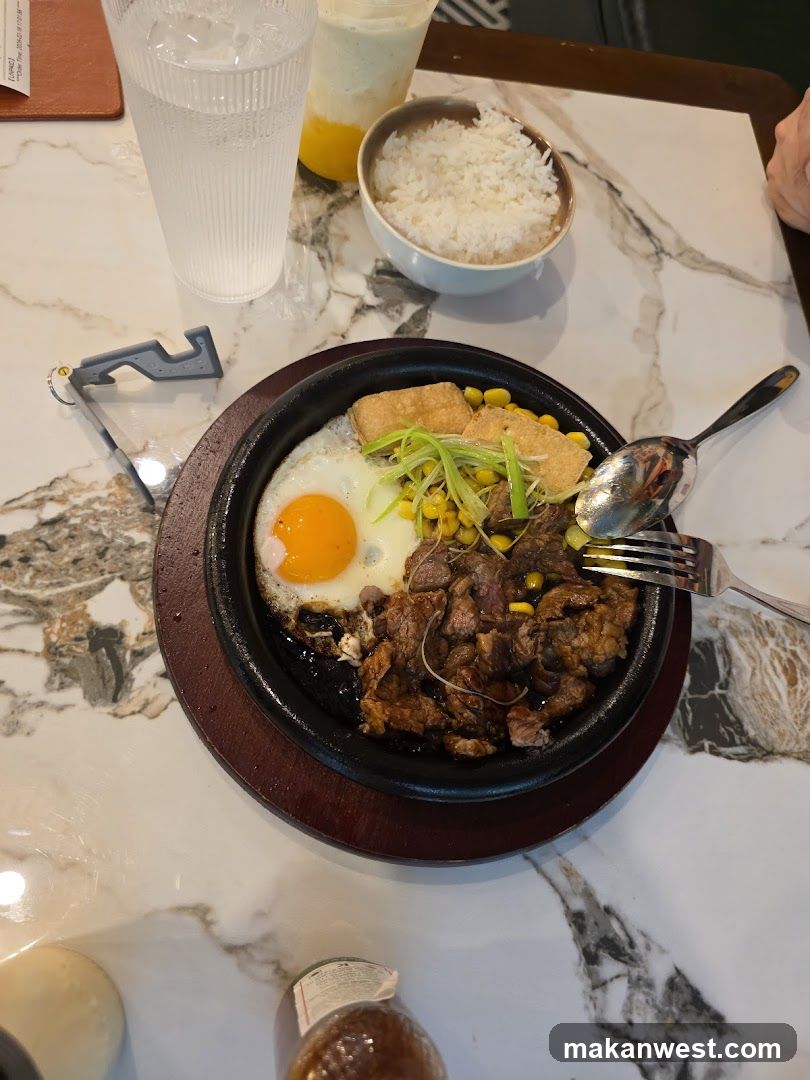 Sizzling Stone Pot Meal with Rice and Drinks