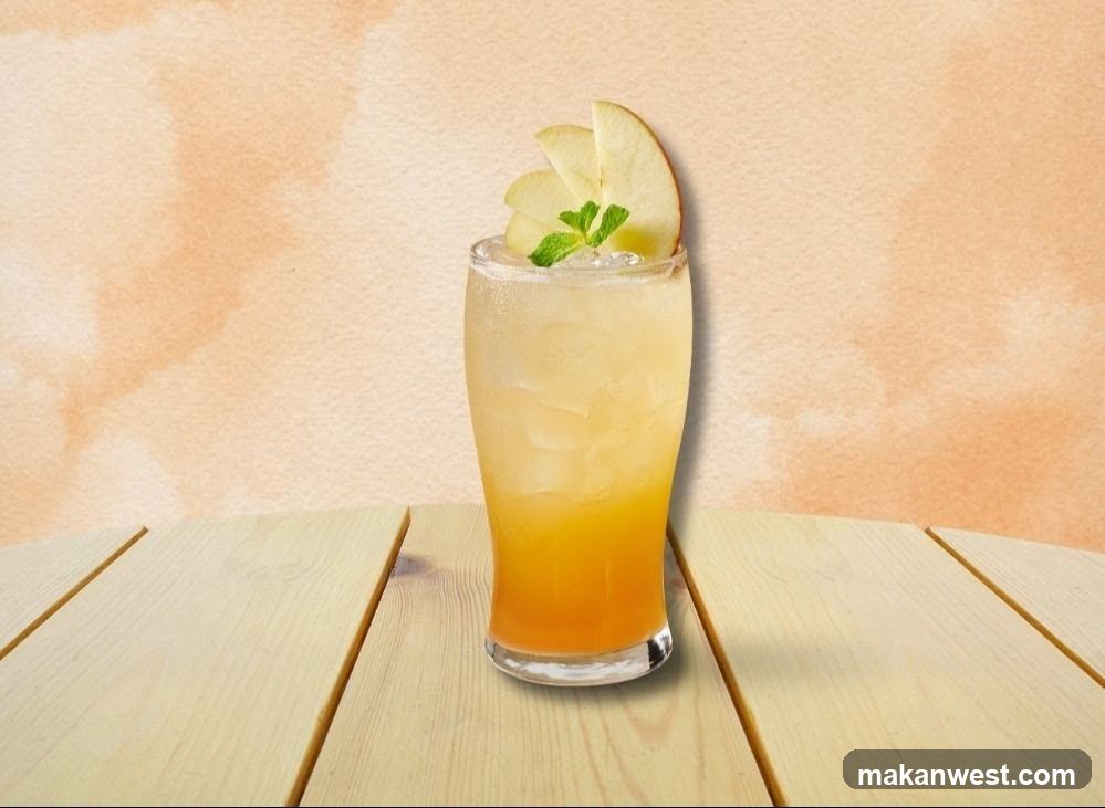 Apple Cider Drink with Mint Garnish