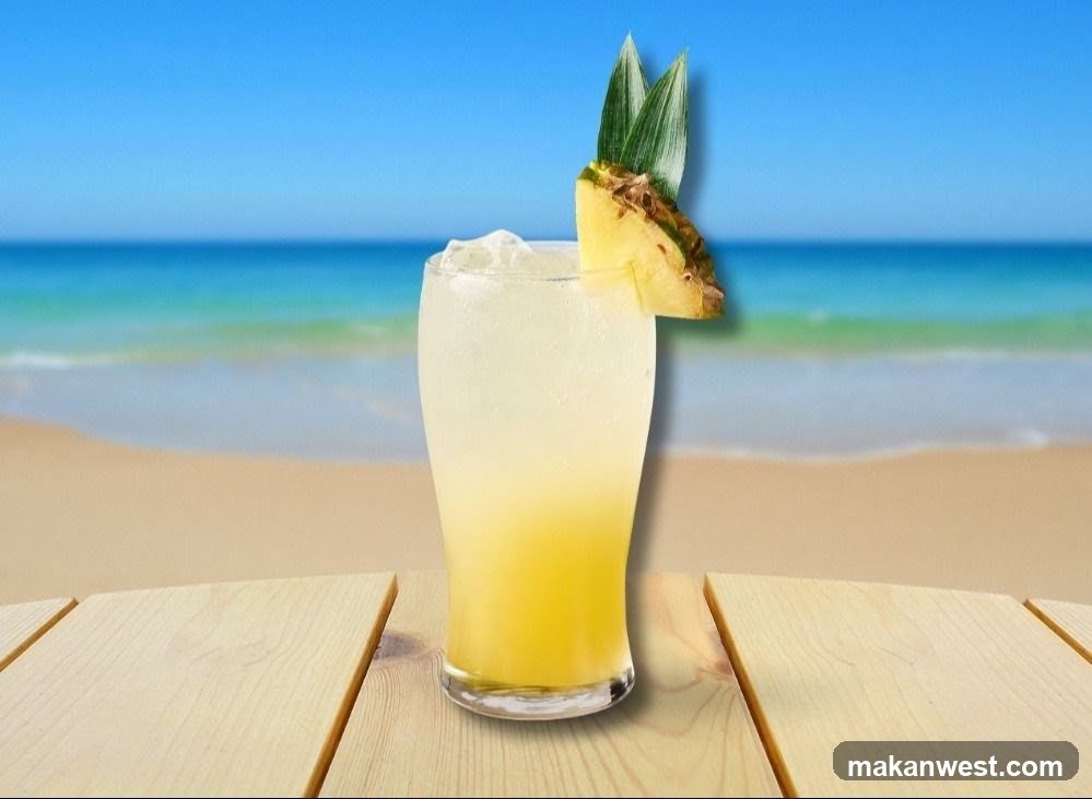 Tropical Cocktail on Beach Table