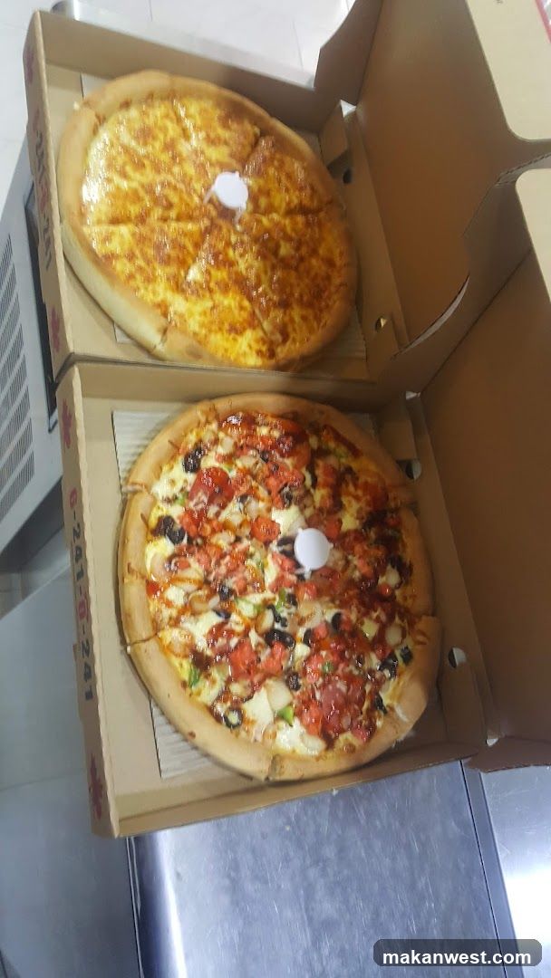 Two Pizzas in Boxes