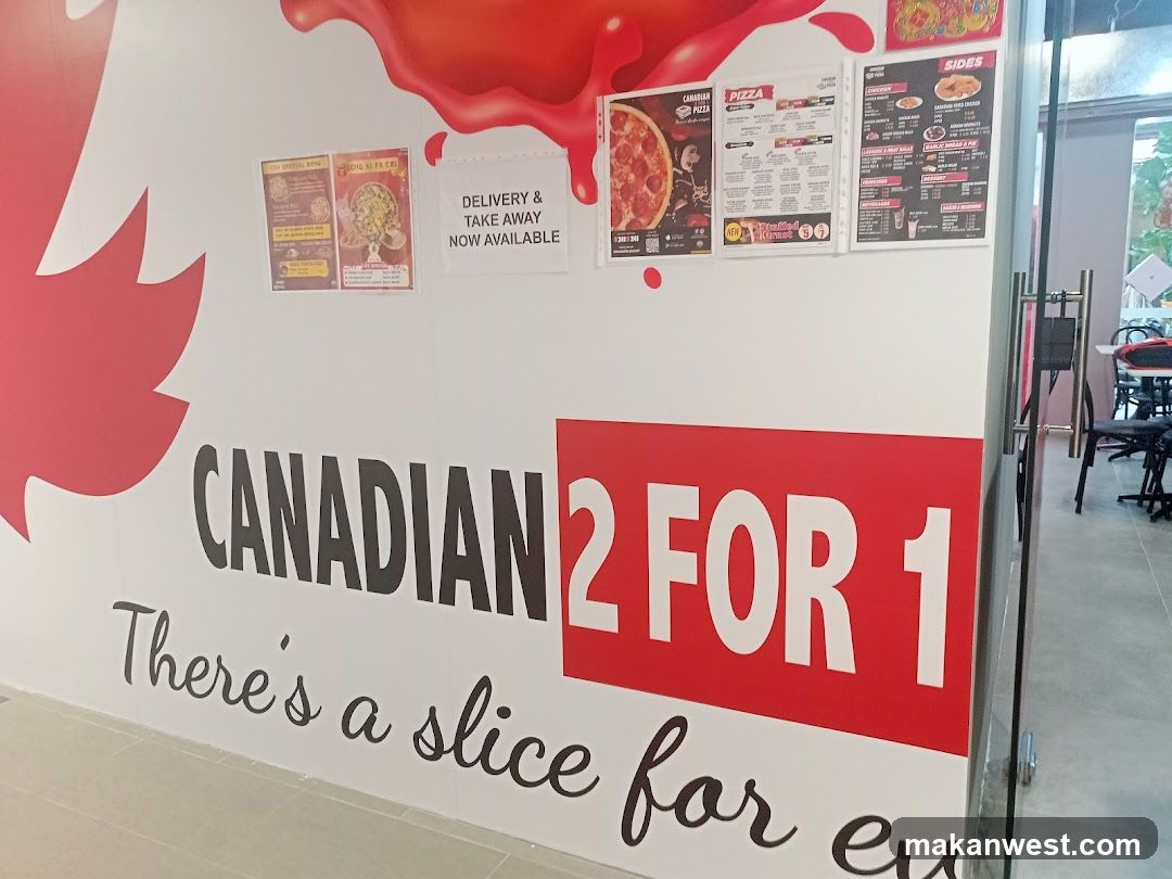 A storefront wall features a large red maple leaf graphic and bold signage reading 'CANADIAN 2 FOR 1' with the tagline 'There's a slice for ev'. Above, several posters are displayed including pizza menus, delivery notices, and side dishes listings. The entrance is visible on the right showing chairs inside.