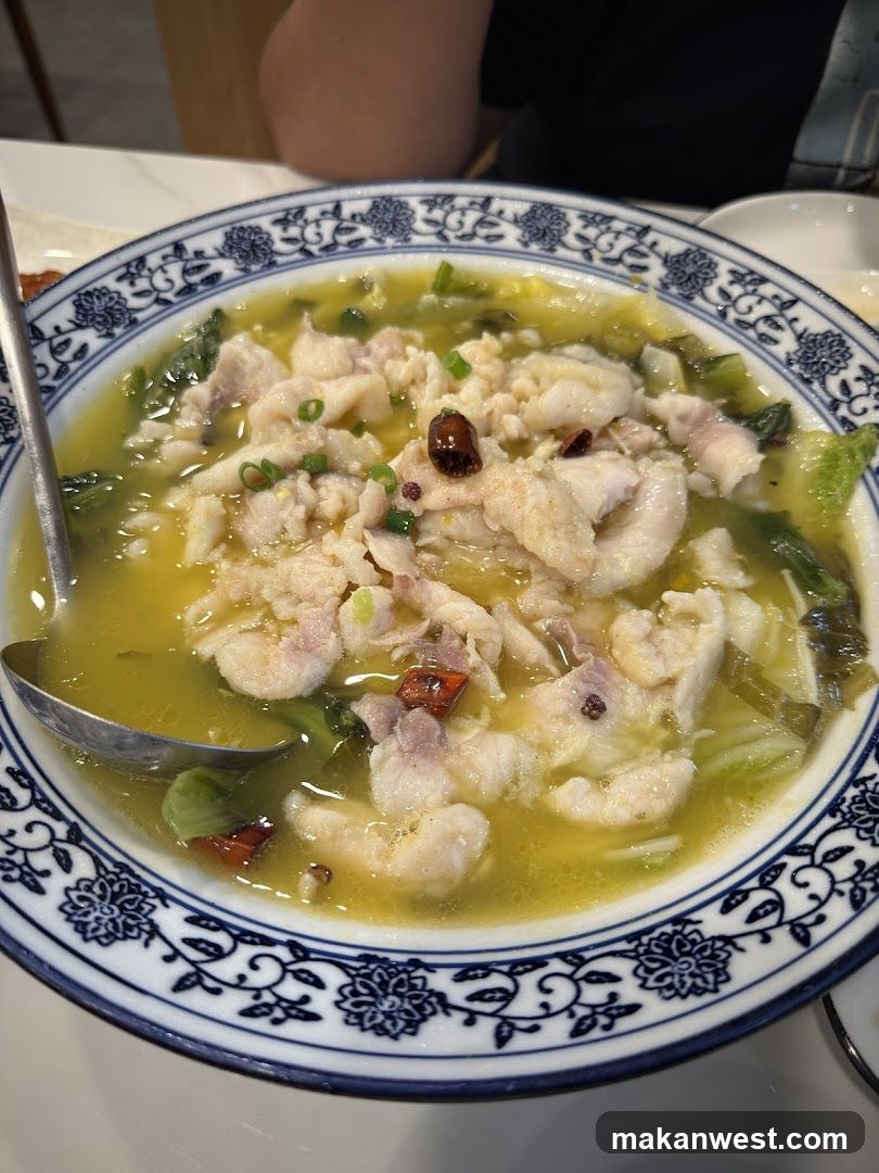 Bowl of Fish Fillet Soup with Greens