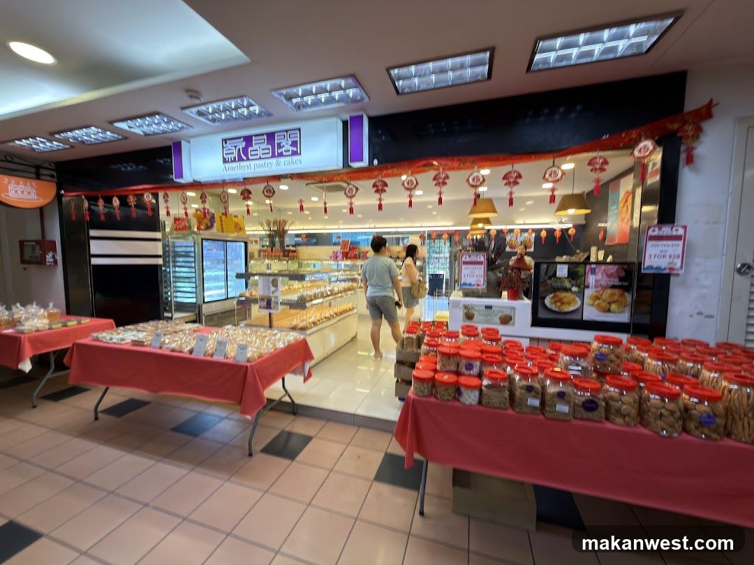 A Chinese bakery interior with product displays