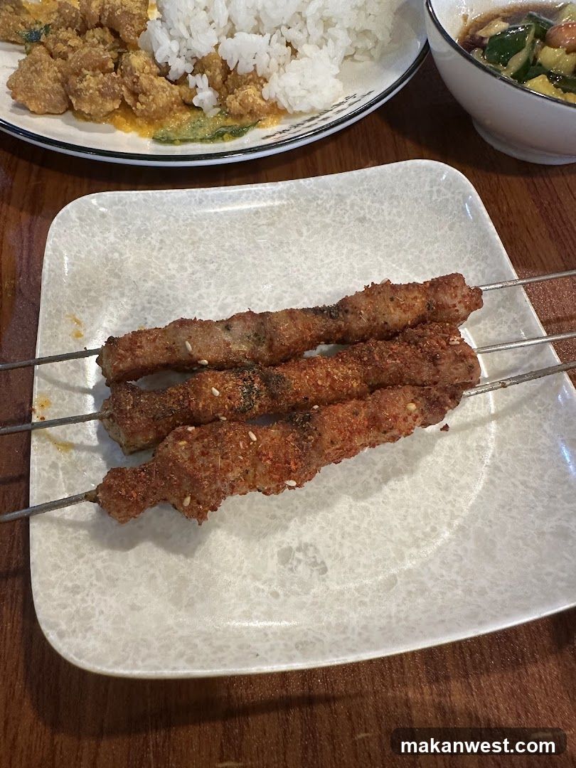Grilled Skewers and Rice Meal