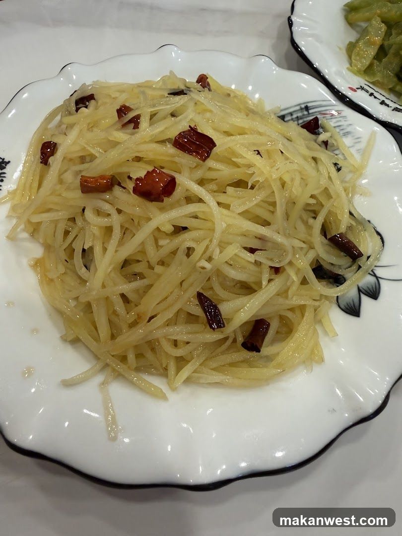 Stir-fried shredded potatoes with dried chilies