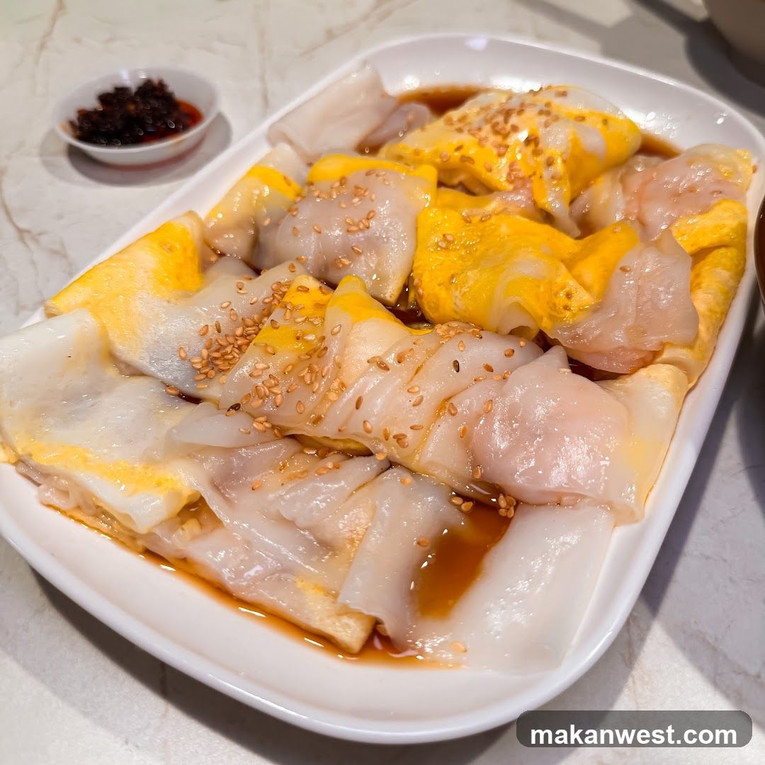 Steamed Rice Rolls with Egg and Sesame Seeds