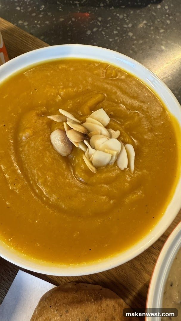 Bowl of Pumpkin Soup with Almonds