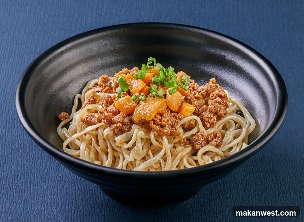 Bowl of Noodles with Meat Sauce and Vegetables