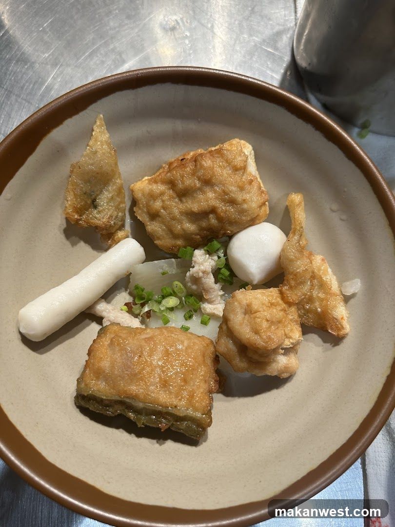 Fried Food Dish with Rice Cake and Fish Ball