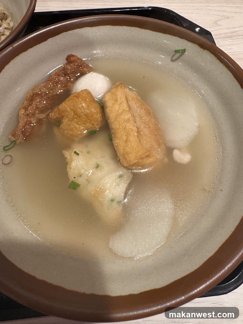 Japanese-style soup bowl with tofu and fish balls