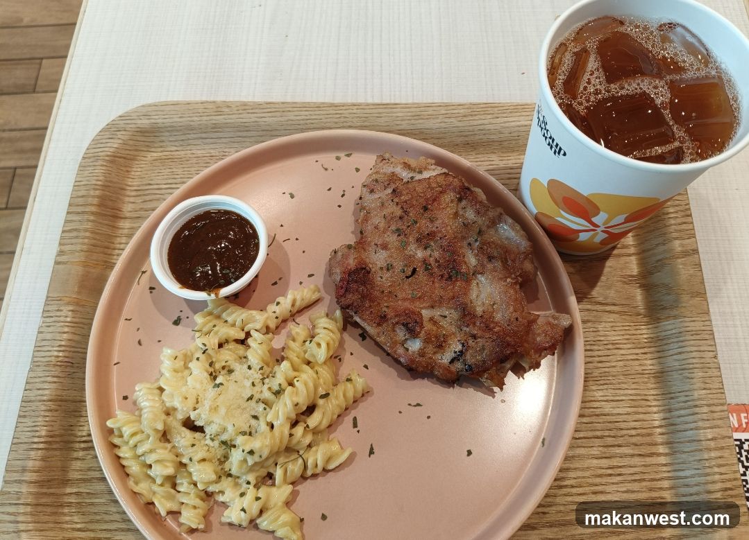 Pork Chop Meal with Pasta and Iced Tea