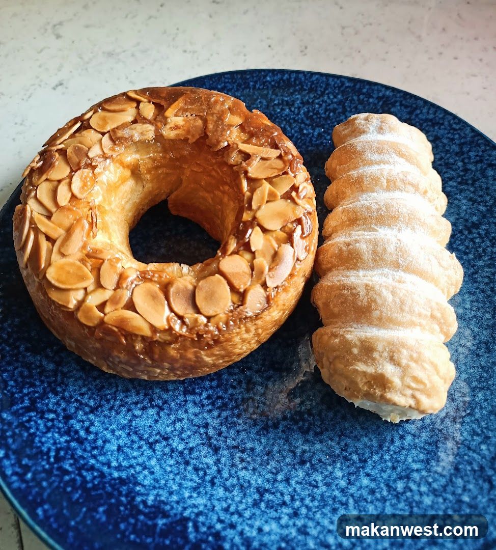 Almond Donut and Pastry on Blue Plate