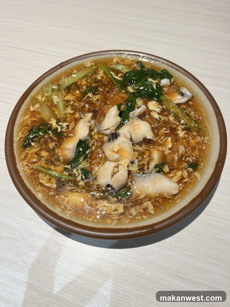 Seafood Soup with Egg and Greens