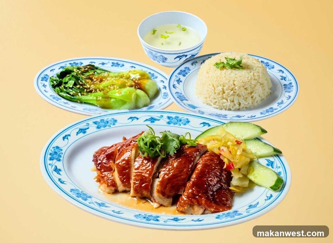 Chinese-style meal with roasted duck, rice, and vegetables