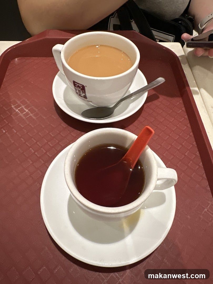 Two cups of tea on a tray
